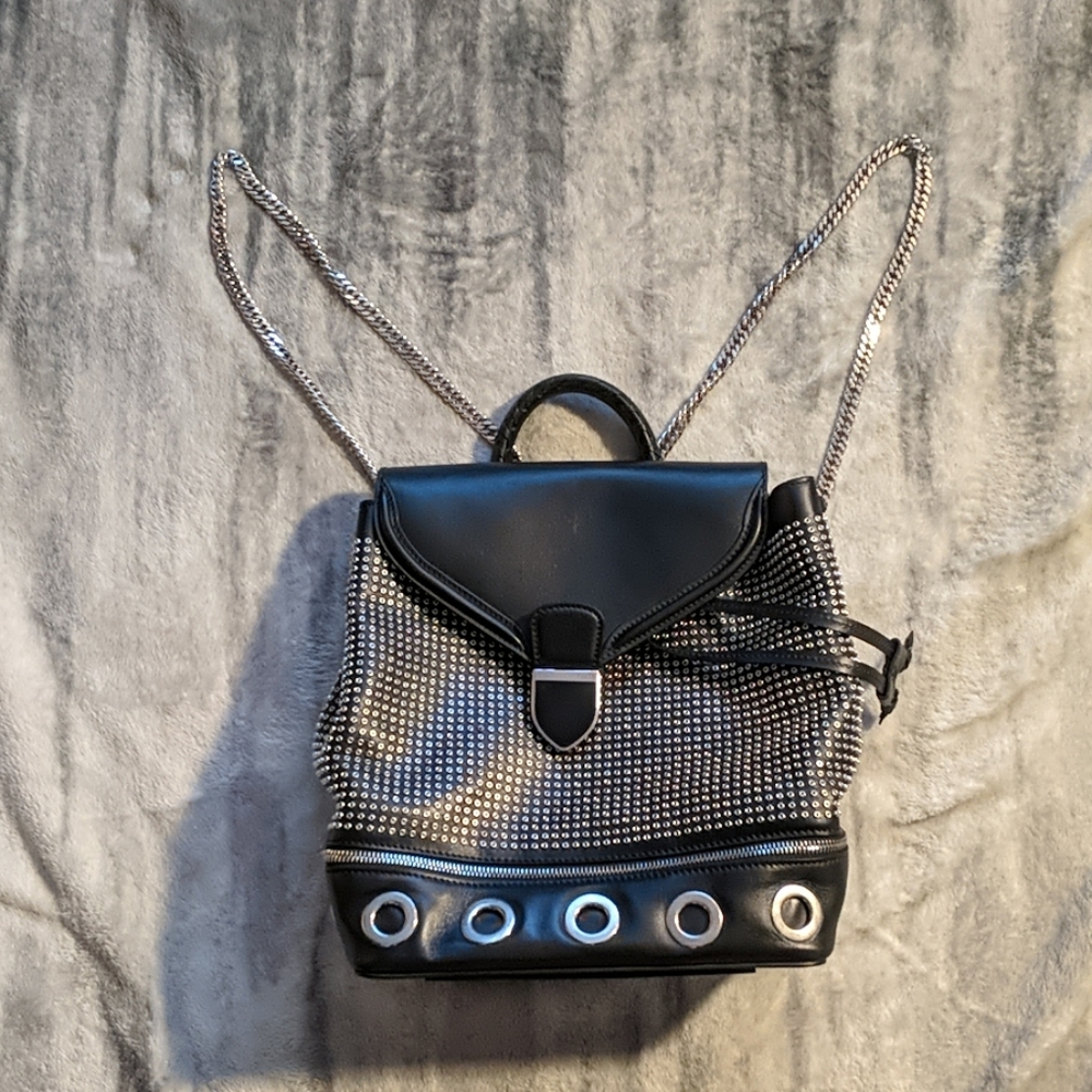 Alexander McQueen grommet backpack bag